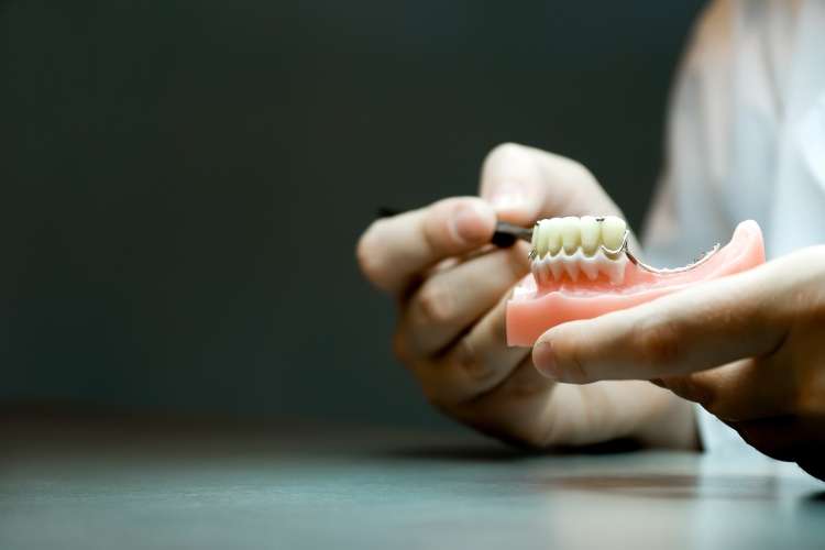 Custom fitted Dentures created by experts at Serpentine Green Dental